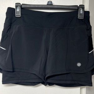 Athleta brand lightweight running shorts.